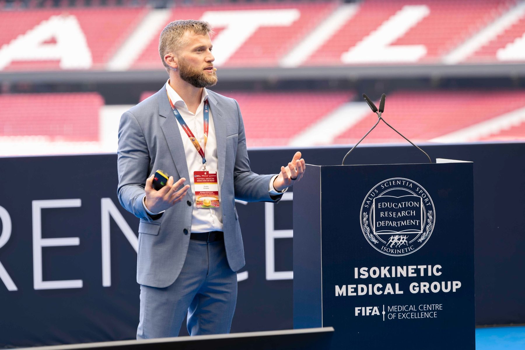 Dustin Grooms speaking at conference